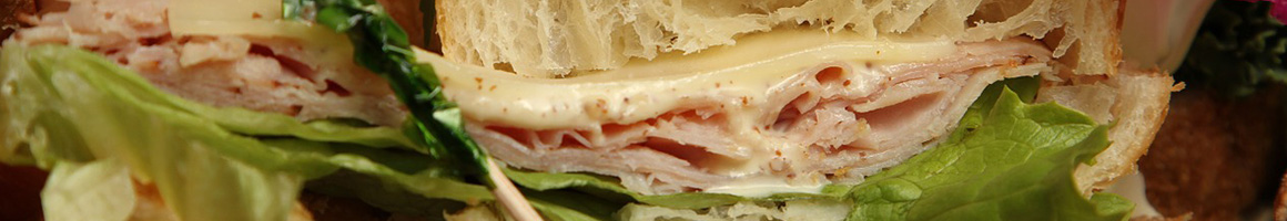 Eating Sandwich at Erbert and Gerberts restaurant in Fargo, ND.